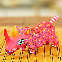 Wood alebrije figurine, 'Cute Rhino in Pink' - Mexican Hand-Painted Wood Alebrije Rhino Figurine in Pink