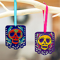 Wood ornaments, 'Mexican Custom' (pair) - 2 Colorful Hand-Painted Wood Day of the Dead Skull Ornaments