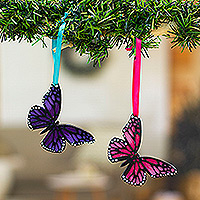 Wood ornaments, 'Monarchs of Hope' (pair) - Pair of Hand-Painted Wood Butterfly Ornaments with Ribbons