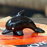 Marble figurine, 'Nocturnal Fins' - Handcrafted Dolphin-Shaped Dark-Palette Marble Figurine