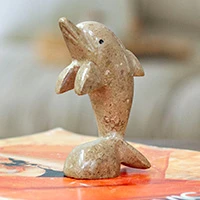 Marble figurine, 'Harmonious Sea' - Dolphin-Themed Natural Marble Figurine in an Earthy Palette