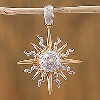 Gold accented sterling silver pendant,