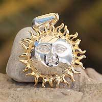 Gold accented pendant,