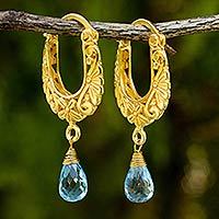 Gold plated blue topaz flower earrings,