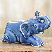 Celadon ceramic candleholder Reclining Blue Elephant Thailand
