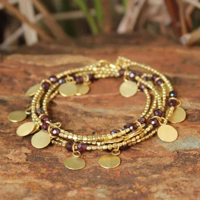 Gold plated wrap bracelet, 'Golden Suns' - Handmade Gold Plated Garnet Charm Bracelet