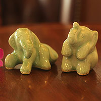Celadon ceramic figurines, 'Elephant Play Time' (pair) - Celadon ceramic figurines (Pair)