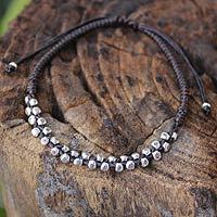 Silver accent braided bracelet,