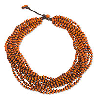 Wood torsade necklace, 'Lamphan Belle' - Orange Torsade Necklace Wood Beaded Jewelry