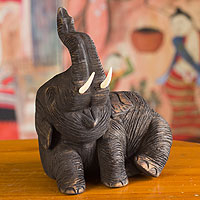 Teakwood sculpture Laughing Elephant Thailand