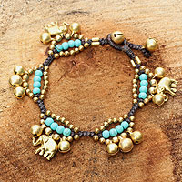 Brass charm bracelet, 'Fortune's Blue Melody' - Elephant and Bell Charm Bracelet in Blue Gems and Brass