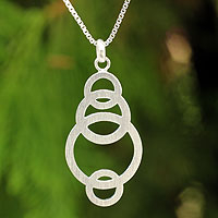 Sterling silver pendant necklace, 'Circle Dance' - Artisan Crafted Silver Geometric Necklace