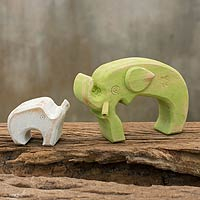 Featured review for Wood sculpture, Green Elephant Family (pair)