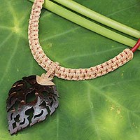 Leather and coconut shell flower necklace,