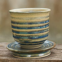 Ceramic tea cup and saucer Rising Dawn Thailand