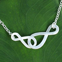 Sterling silver pendant necklace, 'Into Infinity' - Brushed Sterling Silver Necklace with Infinity Symbols