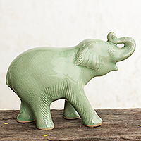Celadon ceramic figurine, 'Laughing Elephant' - Thai Artisan Crafted Celadon Ceramic Elephant Figurine