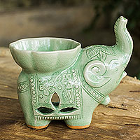 Celadon ceramic oil warmer, 'Time to Relax' - Handmade Light Green Celadon Ceramic Elephant Oil Warmer