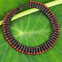 Carnelian and coconut shell beaded necklace,