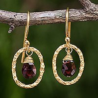 Gold plated garnet dangle earrings,