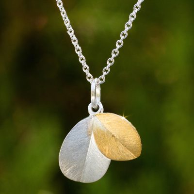 Gold vermeil and sterling silver pendant necklace, 'Sunlit Leaves' - Leaf Theme 24k Gold Vermeil and Sterling Silver Necklace