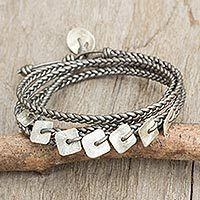 Silver and leather wrap bracelet,
