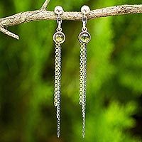 Gold accented peridot dangle earrings,