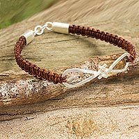 Sterling silver and leather pendant bracelet,