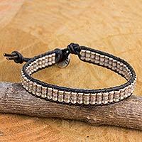 Silver and leather beaded cord bracelet,