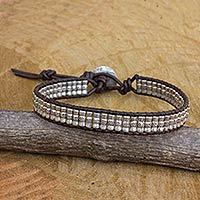 Silver and leather beaded cord bracelet,