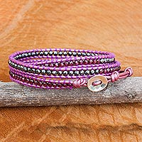 Hematite and garnet wrap bracelet, 'Lavender Wine' - Dyed Leather Garnet Hematite Sterling Silver Wrap Bracelet