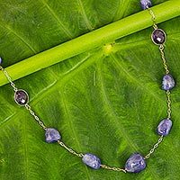Gold plated tanzanite and amethyst long station necklace,