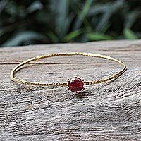Gold plated garnet bangle bracelet,