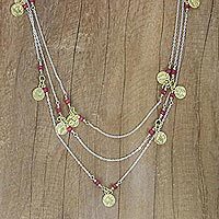 Gold accented ruby long station necklace,