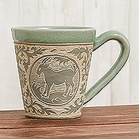 Celadon ceramic mug, 'Thai Zodiac Goat' - Celadon Glazed Ceramic Mug with Goat from Thailand