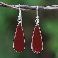 Rhodium plated carnelian dangle earrings,