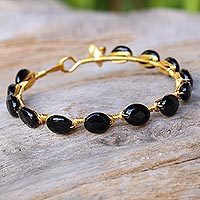Gold plated onyx bangle bracelet,