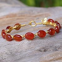 Gold plated carnelian bangle bracelet,