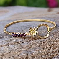 Gold plated garnet bangle bracelet,