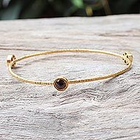 Gold plated garnet bangle bracelet,