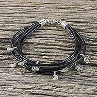 Silver accent leather charm bracelet,