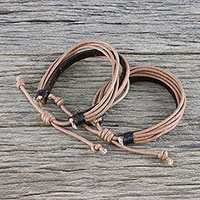 Men's leather and cotton cord bracelets, 'Bold Espresso Contrast' (pair) - Pair of Men's Leather Cord Wristband Bracelets from Thailand