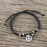 Silver beaded cord bracelet, 'Peace and Amity' - Ebony Colored Cord Beaded Bracelet with Silver Peace Charm