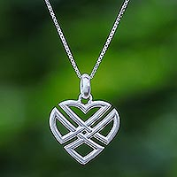 Sterling silver pendant necklace, 'Combined Heart' - Handmade Heart Shaped 925 Sterling Silver Pendant Necklace