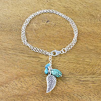 Silver charm bracelet, 'Lively Leaf' - Silver and Recon Turquoise Leaf Bracelet from Thailand