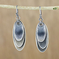 Sterling silver dangle earrings, 'Mystical Trios' - Curvy Sterling Silver Dangle Earrings from Thailand