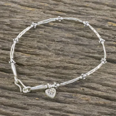 Silver and sterling silver charm bracelet, Cluster of Charm