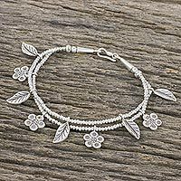 Silver beaded charm bracelet,