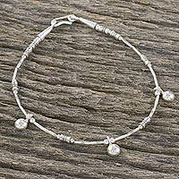 Sterling silver charm bracelet,