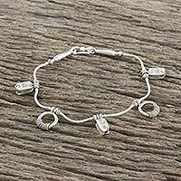 Sterling silver charm bracelet,